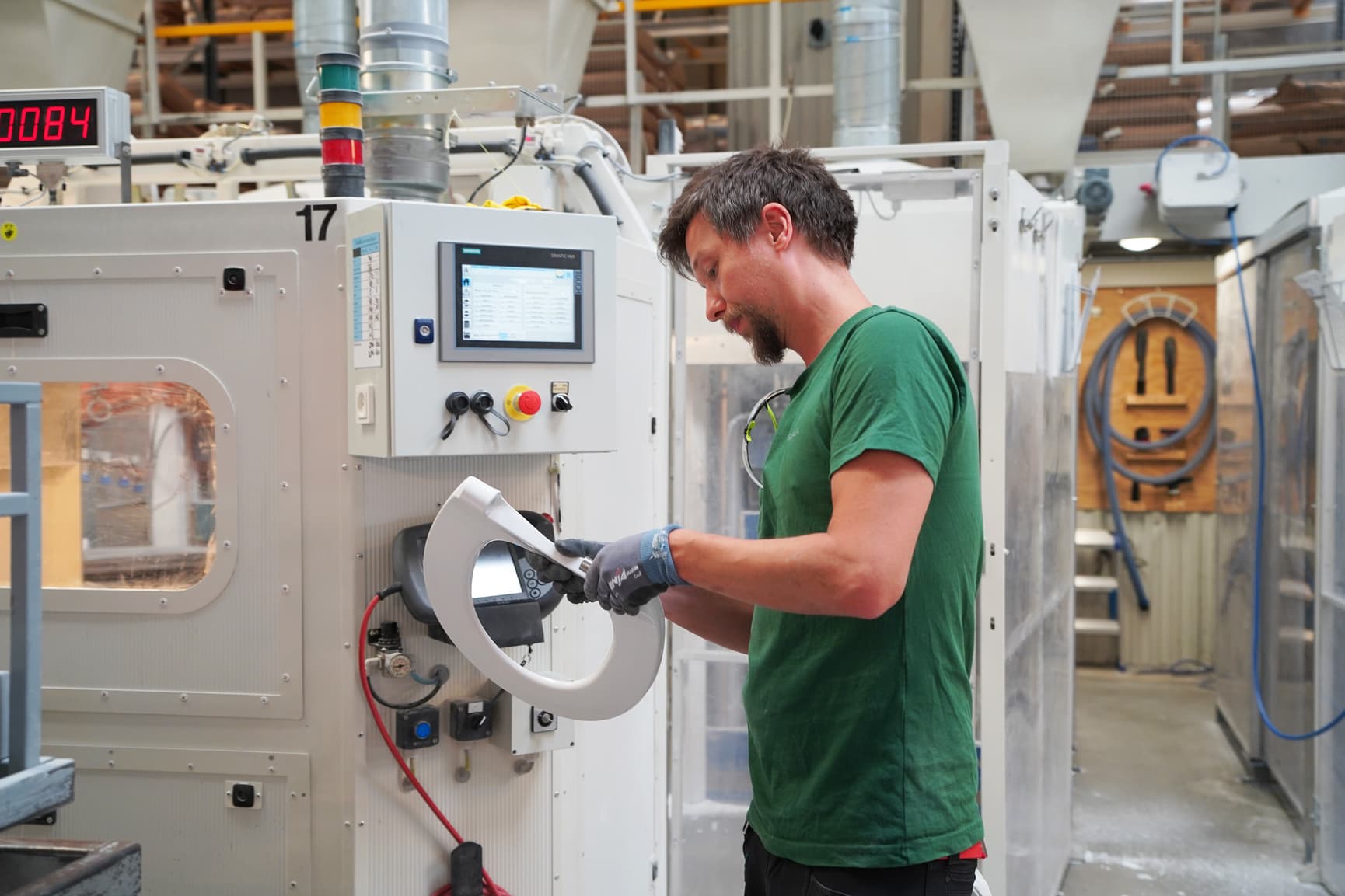 Pressalit employee working in our factory